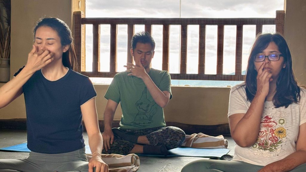 Practitioner sitting in silence meditation at a peaceful meditation retreat in Pokhara
