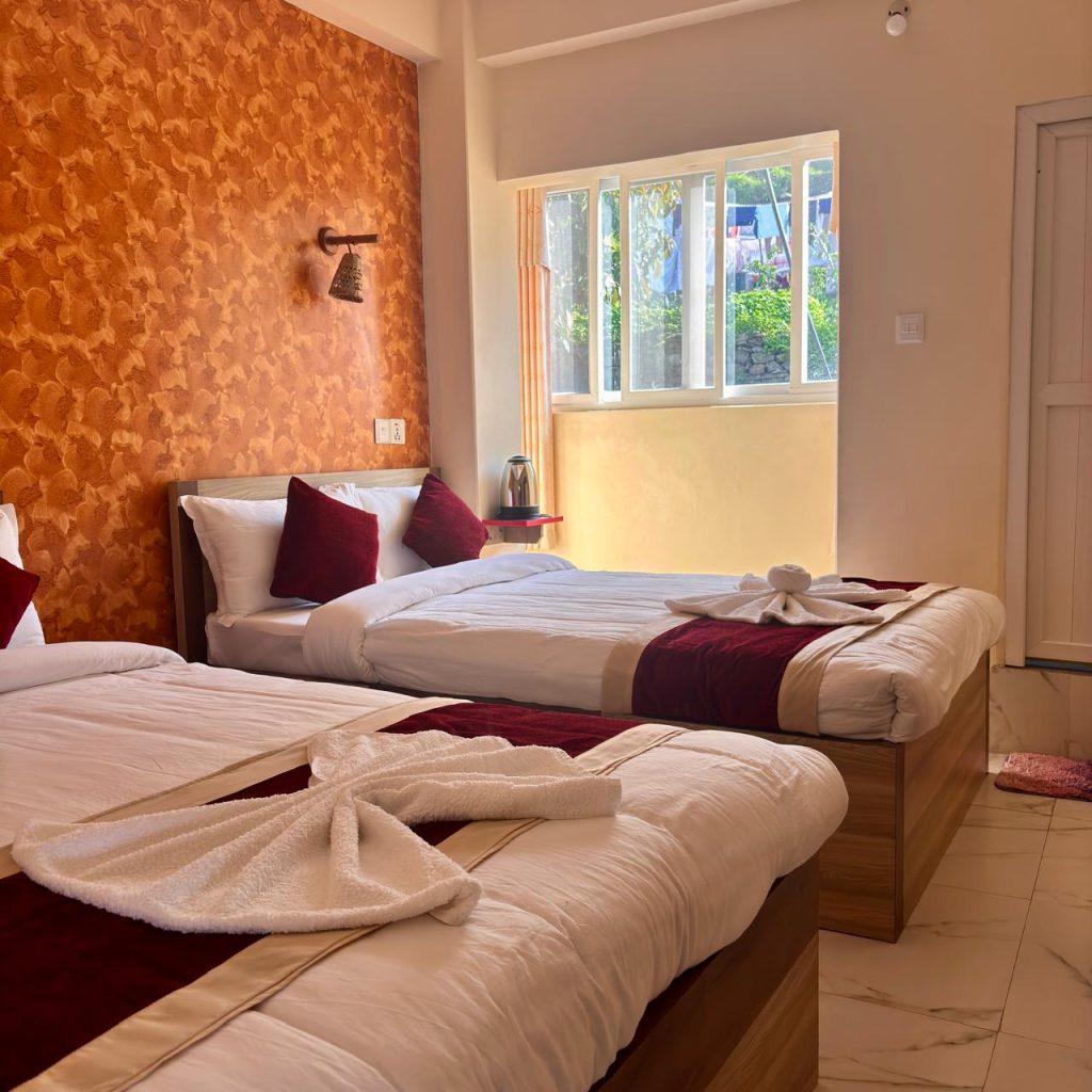 Cozy retreat room at Sound Healing Retreat in Pokhara featuring a calm interior, comfortable bedding, natural light, and a peaceful healing atmosphere
