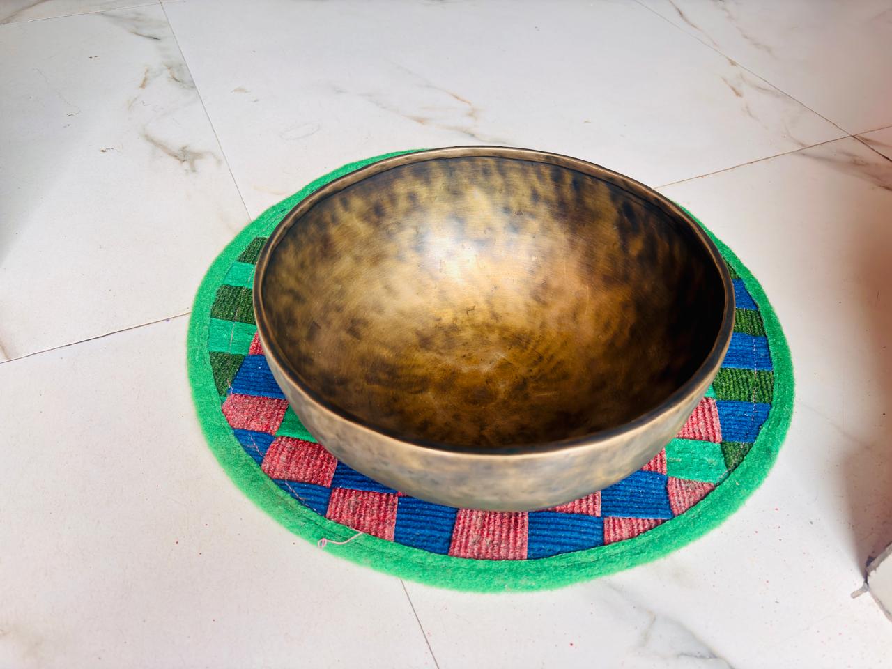 Authentic handmade Himalayan singing bowl in Pokhara Nepal used for meditation chakra balancing and sound healing training at Unmani Yoga Retreat