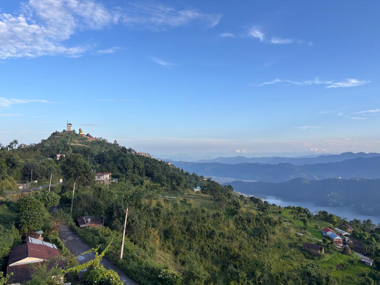 View of Sarangkot, Pokhara, Nepal from Unmani Yoga Retreat overlooking Phewa Lake and surrounding hills